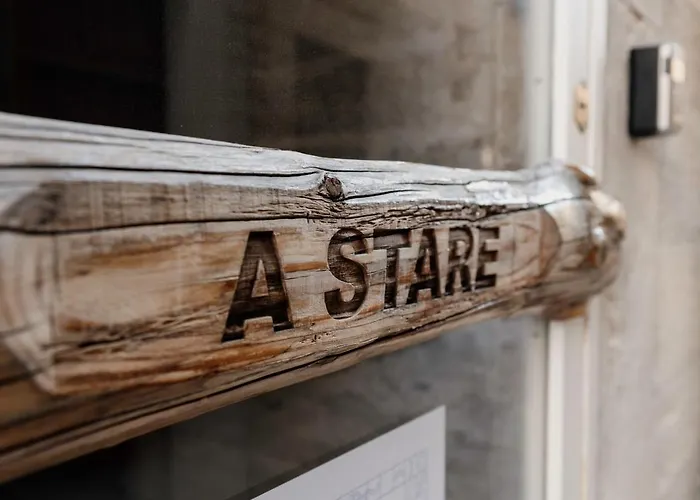 A Stare - Stone In The Historic Center - *